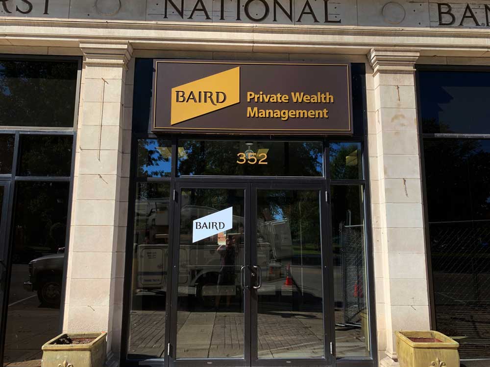 Exterior window signage and plaque signs for Baird, by Identiti.