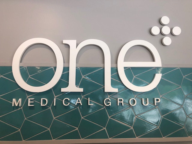Interior branding for One Medical.
