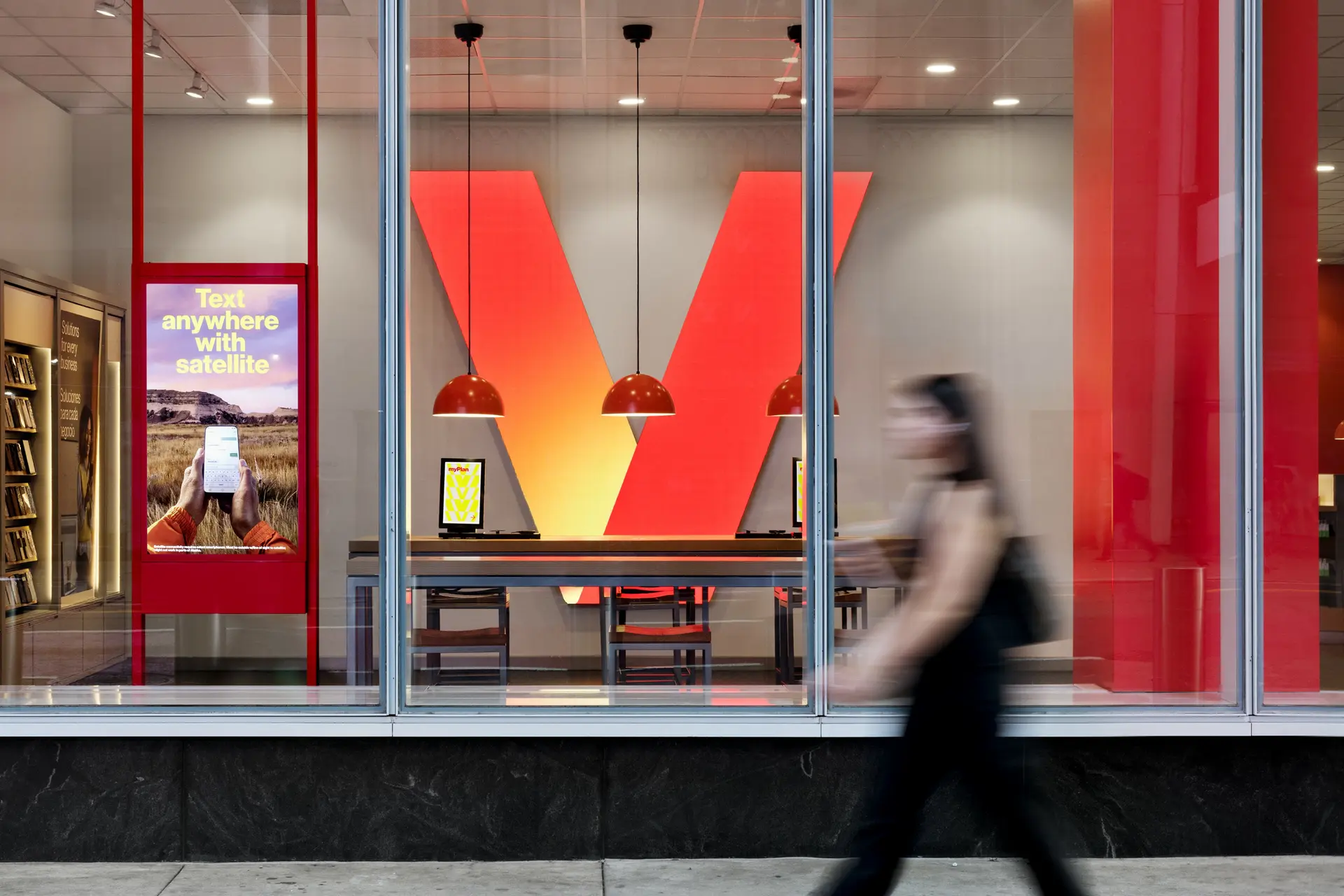 Exterior of a Verizon retail location with signage by Identiti.