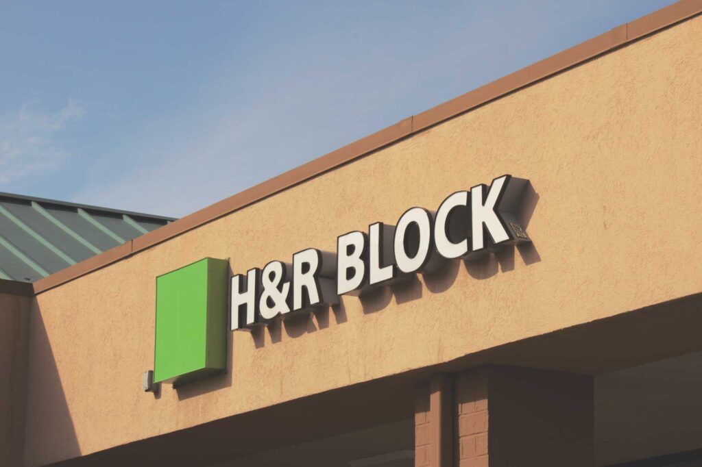 Exterior of an H&R Block retail location featuring signage by Identiti.
