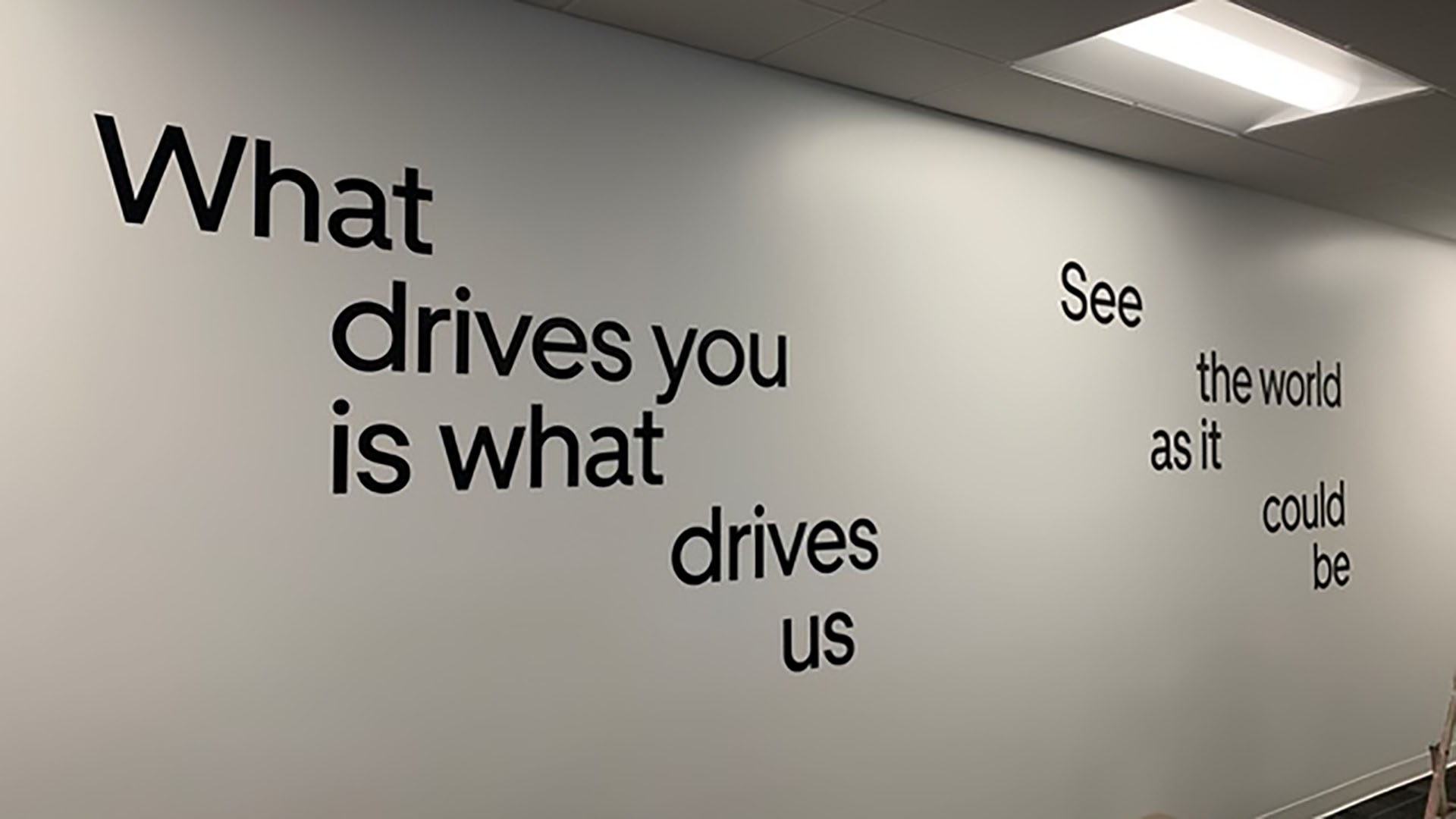 Vinyl wall lettering for Uber's corporate office, installed by Identiti.