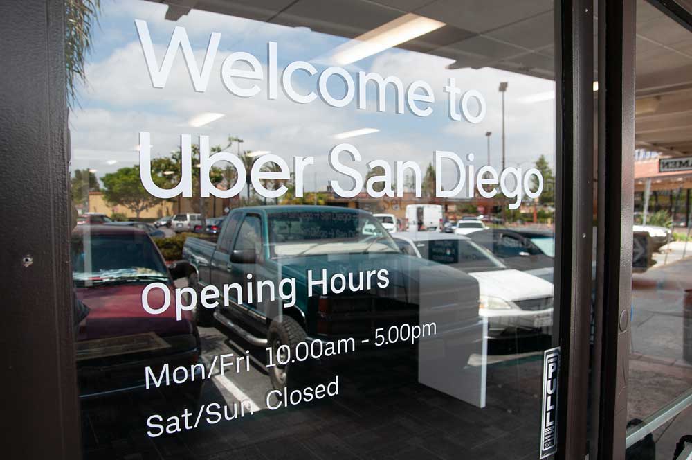 Window signage by Identiti for Uber's North American corporate locations.