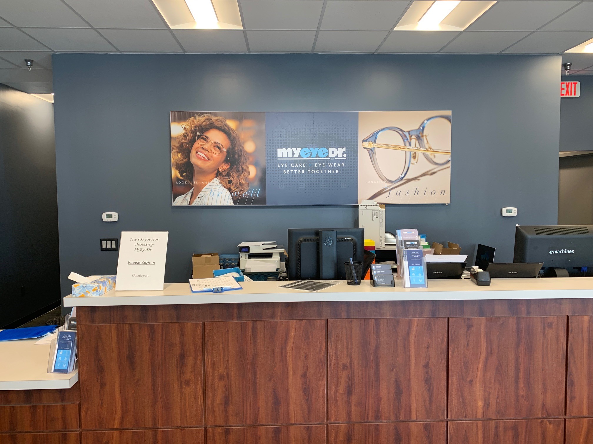 Interior branding for MyEyeDr clinics nationwide, created and installed by Identiti.