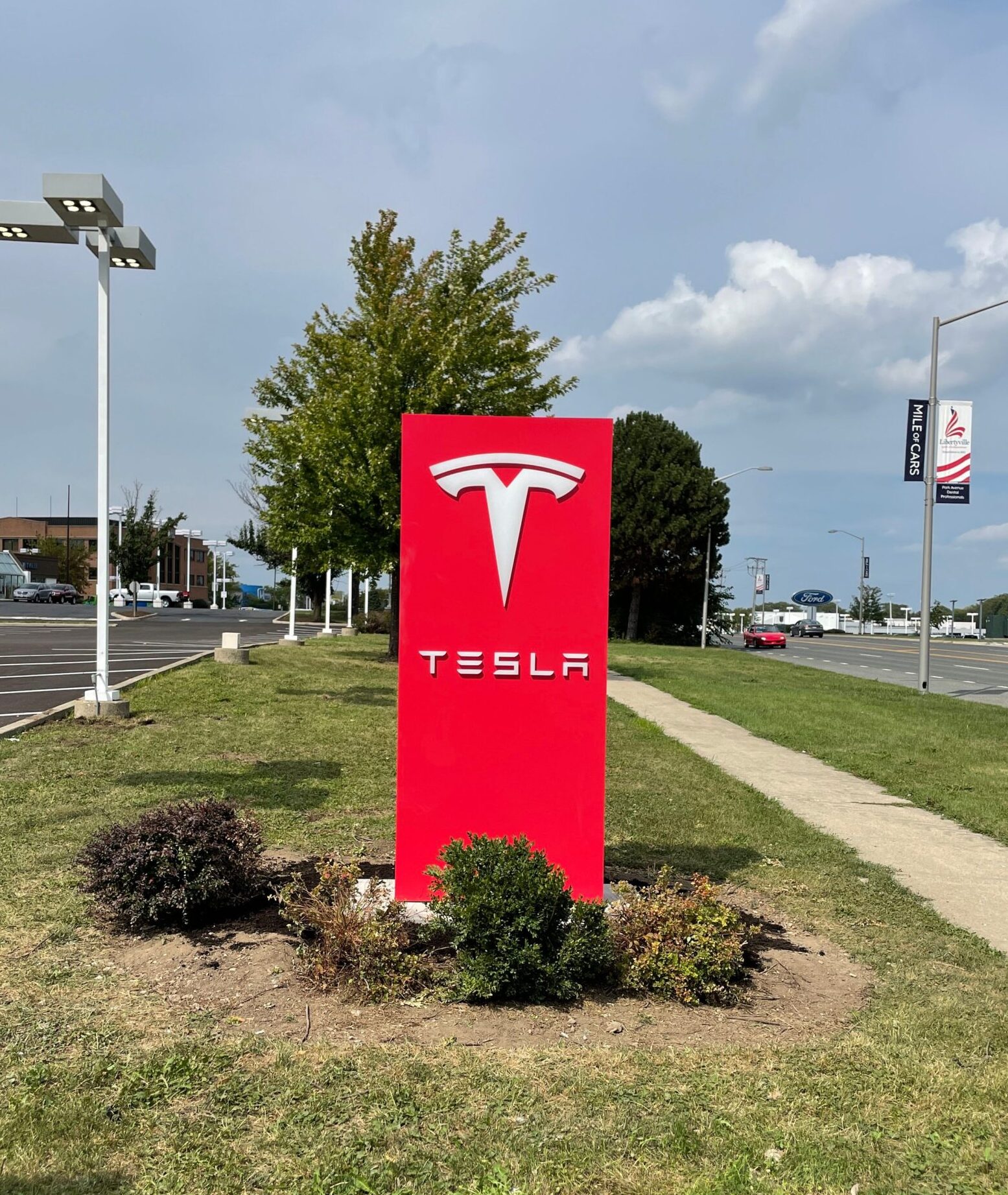 A freestanding Tesla sign by Identiti.