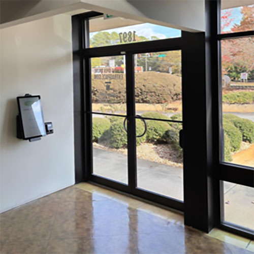 A set of glass doors belonging to a small business client of Identiti.