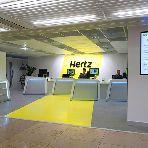 A remodeled interior for a Hertz location, facilitated by Identiti.