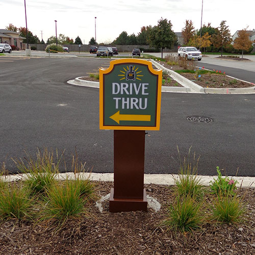 A freestanding directional sign for a Potbelly Sandwich location, by Identiti.