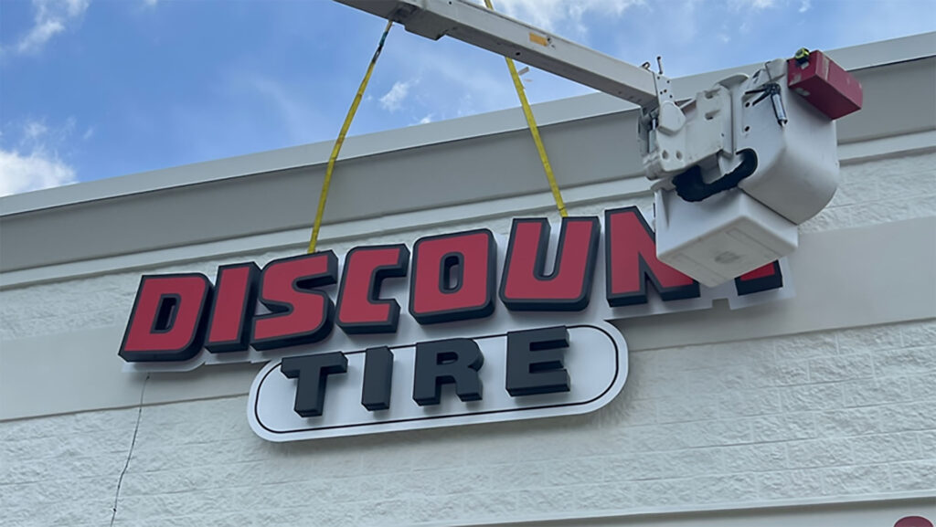 Installation of exterior signage for Discount Tire, handled by Identiti.