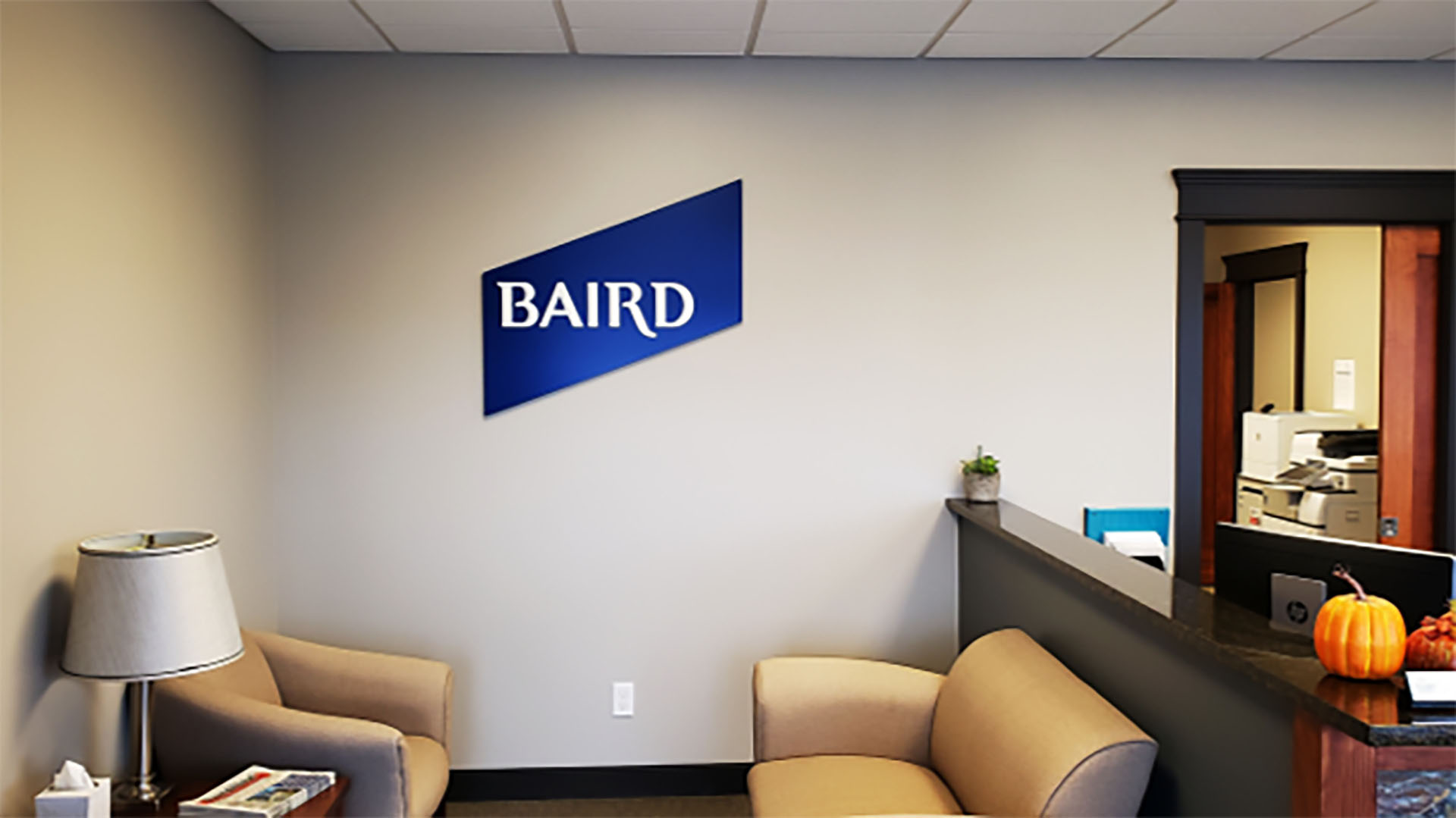 Interior branding by Identiti for a Baird corporate office location.