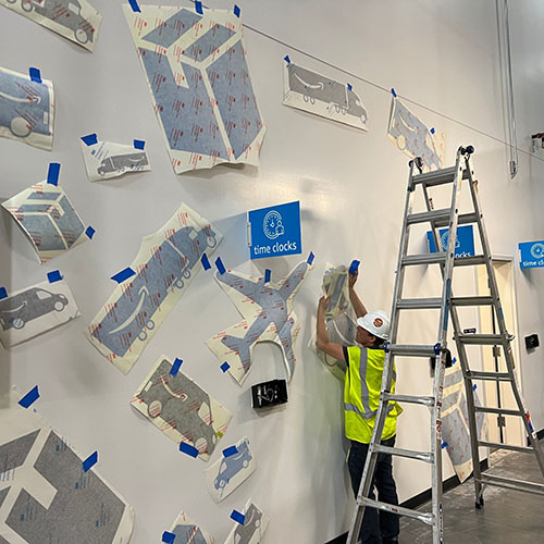 Vinyl wall graphics for an Amazon fulfillment center by Identiti.