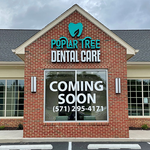 Custom exterior signage for Poplar Tree Dental Care by Identiti.