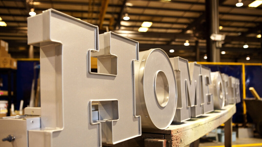 Prepared channel letters reading "Home of the Whopper" for a Burger King rollout by Identiti.
