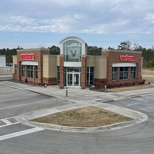 A refreshed Verizon retail location featuring new branding via various sign types by Identiti.