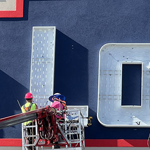 Identiti preferred vendors install an illuminated sign for Lowe's.